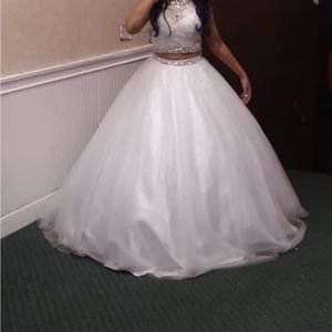 2 piece white lacy dress with a buckled back